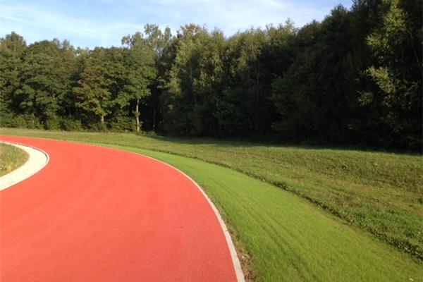 Aanleg kunststof atletiekpiste in vol PU - Sportinfrabouw NV